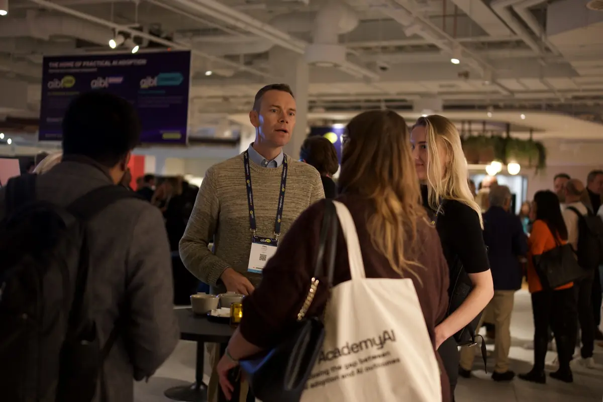 Attendees in conversation between sessions at aiblLIVE 2026